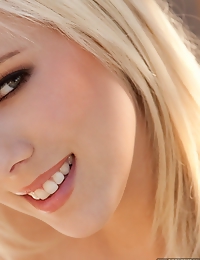 Bibi Jones removes her shirt and skirt